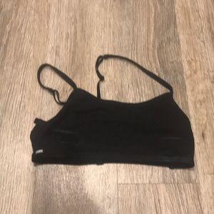Pink VS black sports bra